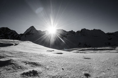 Scenic view of mountains against sky during winter