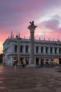 Piazza san marco at a beautiful colorful sunset with orange and pink tones - venice, italy