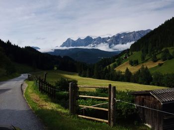 Road passing through field