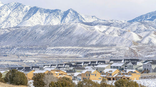 High angle view of snowcapped mountain against sky