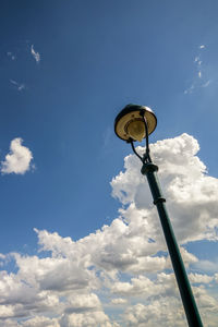 Low angle view of street light against sky