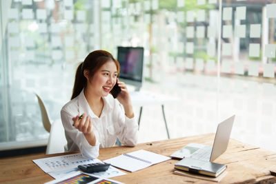 Businesswoman working at office