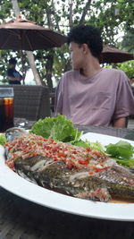 Man having food in restaurant