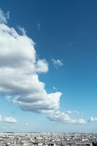 Cityscape against blue sky