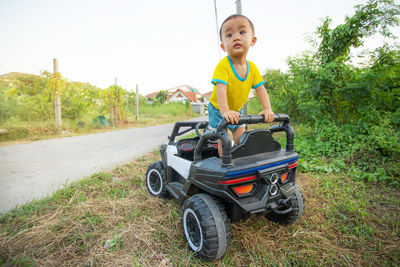 Boy sitting in car