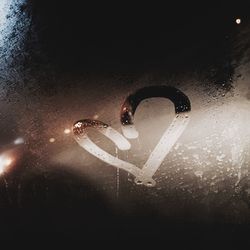 Reflection of trees in water at night