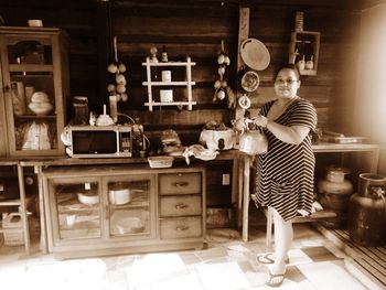 Woman standing at home