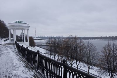 Scenic view of lake against sky during winter