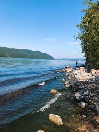 Scenic view of lake baikal against clear blue sky