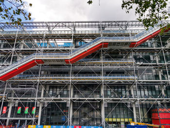 Paris, france, september 2021. detail of the front façade of the famous centre pompidou building