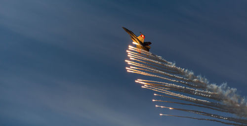 Light painting against blue sky