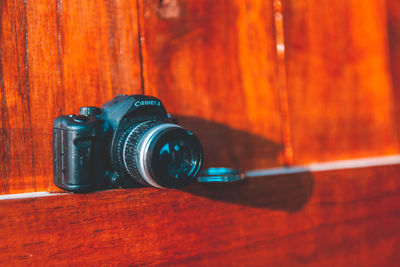 Close-up of camera on table