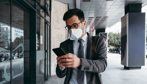 Young man using mobile phone