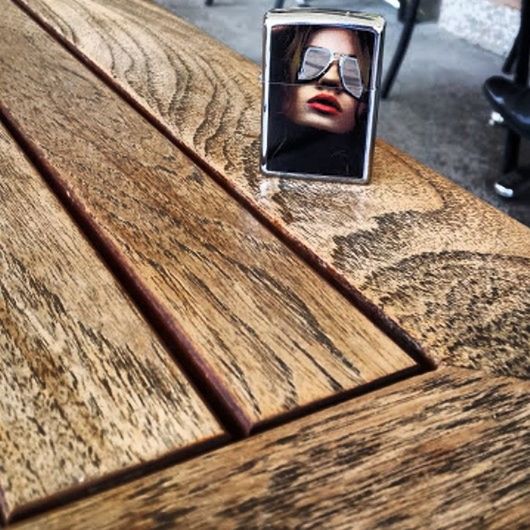 indoors, table, wood - material, still life, wooden, high angle view, close-up, no people, shadow, wood, home interior, selective focus, day, sunlight, single object, flooring, absence, technology, focus on foreground, wall - building feature