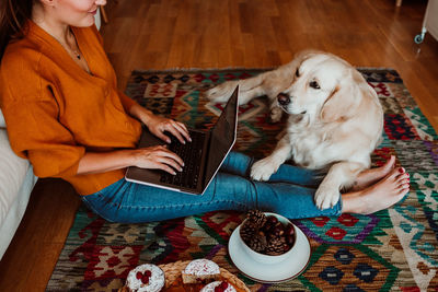 Woman with dog at home