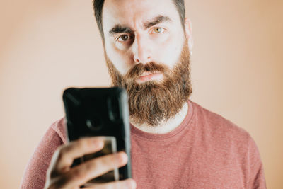 Young man using mobile phone