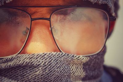 Close-up of young man wearing eyeglasses