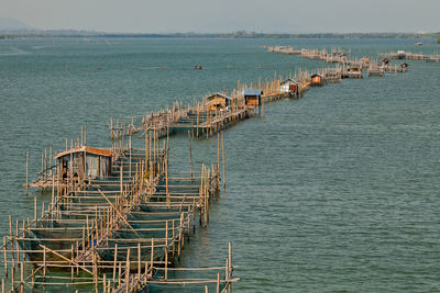 High angle view of pier over sea against sky