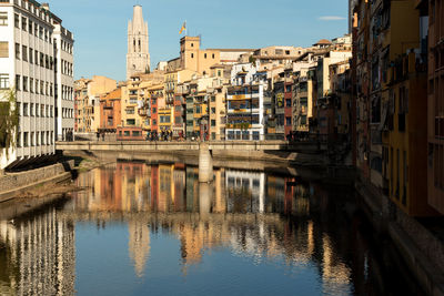 The colorful houses lining the riverbanks of girona in catalunya, spain, 