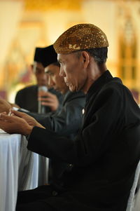 Old man is praying