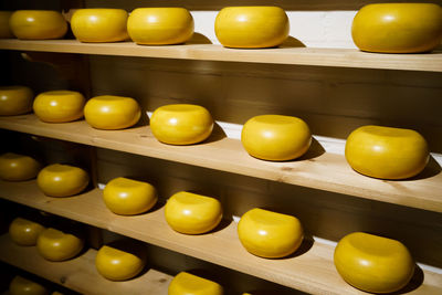 Full frame shot of yellow bell peppers in kitchen