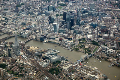 High angle view of crowd and buildings in city