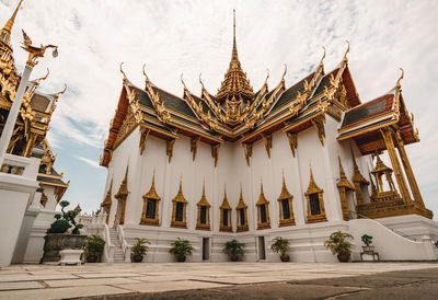 View of temple against building