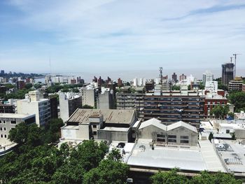 High angle view of cityscape against sea