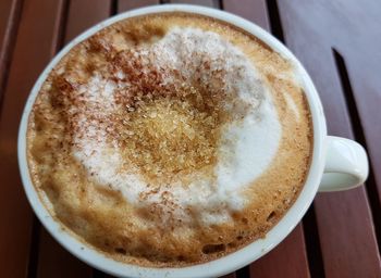 High angle view of cappuccino on table