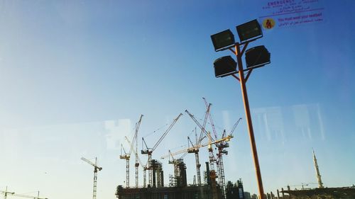 Low angle view of building against blue sky