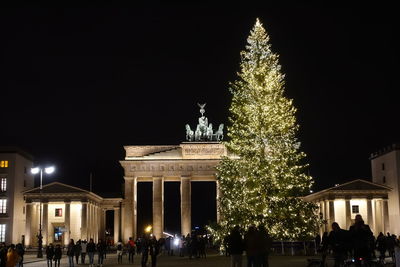 Illuminated christmas tree at night