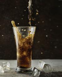 Close-up of drinking glass on table