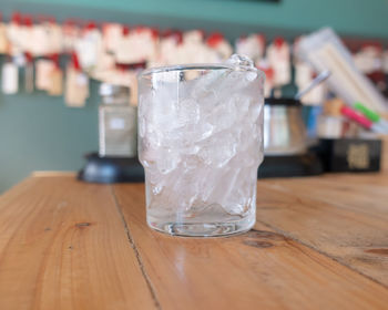 Close-up of beer glass on table