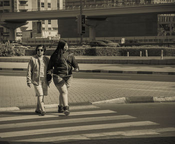 People walking on sidewalk