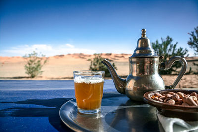 Glass of tea on table
