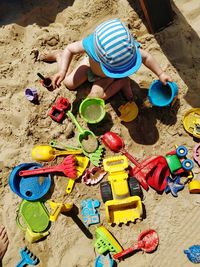 High angle view of toys at beach