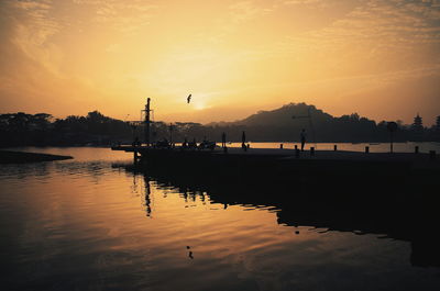 Scenic view of sea at sunset