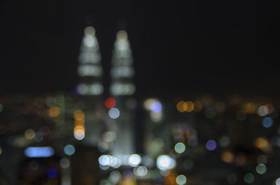 Defocused image of illuminated cityscape