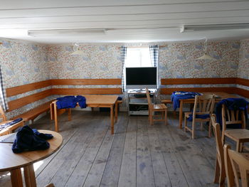 Empty chairs and tables at home