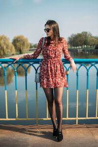 Spring fashion trend, outfit, comfort city look. outdoor portrait of young happy smiling brunette 