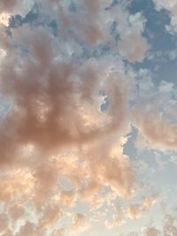 Low angle view of clouds in sky during sunset