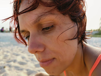Close-up portrait of woman with water