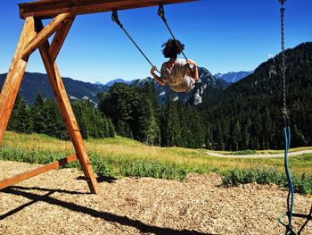 View of swing against sky