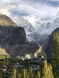 Scenic view of snowcapped mountains against sky