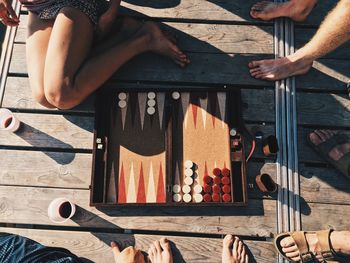 People playing backgammon at dusk