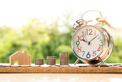 Close-up of clock on table