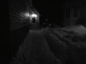 Full length of woman walking at night