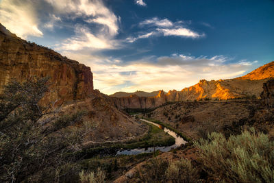 Scenic view of landscape against sky during sunset