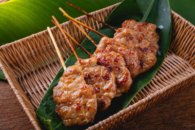 High angle view of meat on barbecue grill