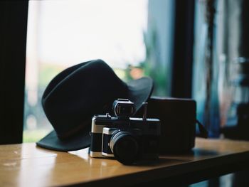 Close-up of camera on table